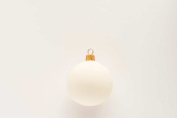 White Christmas ornament with gold cap