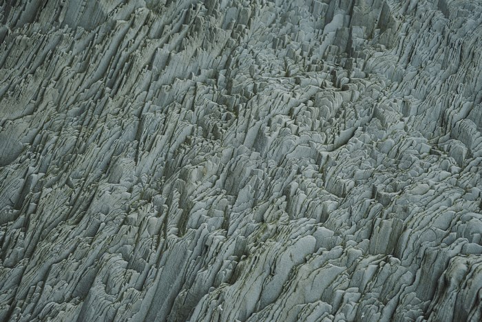 Geological rock formations on a black beach in Iceland