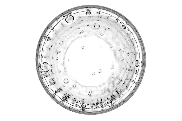 Top view of carbonated water in a glass