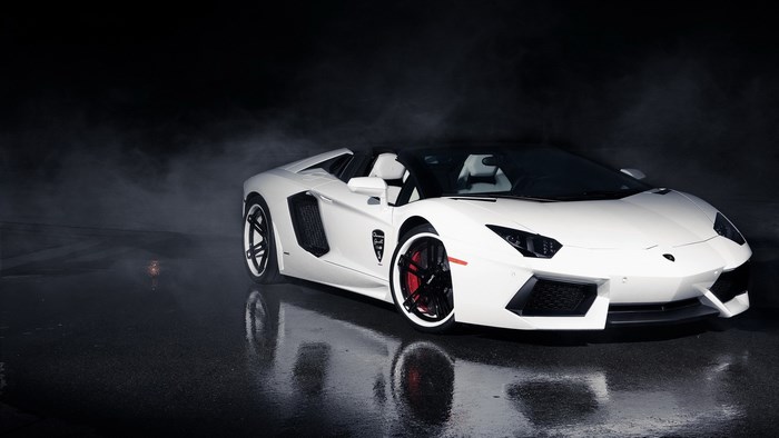 White Lamborghini Aventador Roadster on Wet Road