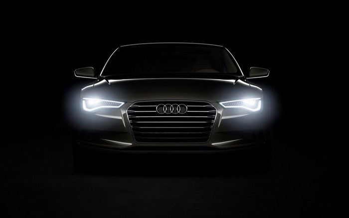 Audi car with headlights on