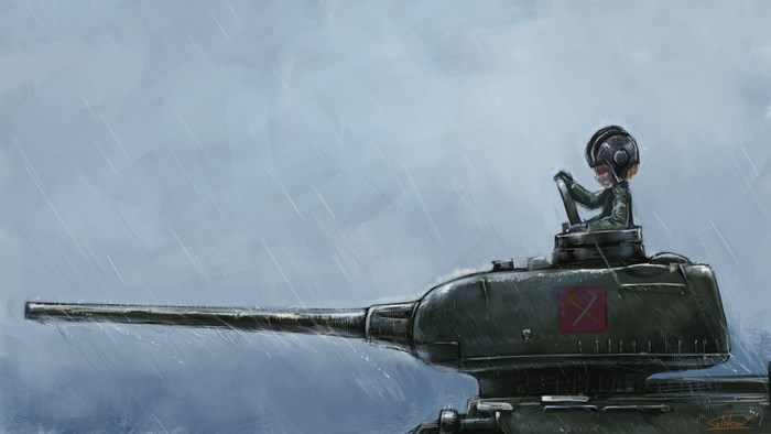 Girl in tank helmet driving a tank