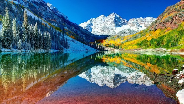 Maroon Bells reflection in lake during autumn