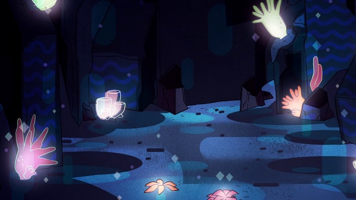 Underwater cave with glowing coral and rocks