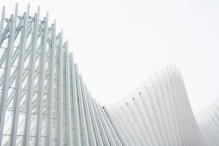 Modern architecture with glass and white metal facade