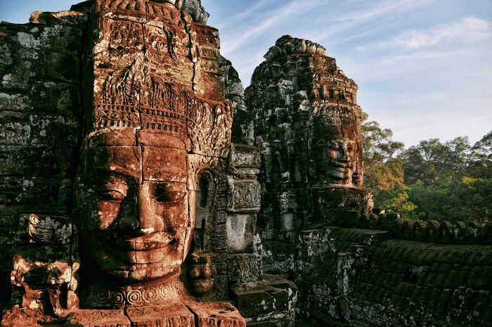 Ancient stone faces of a temple in Cambodia