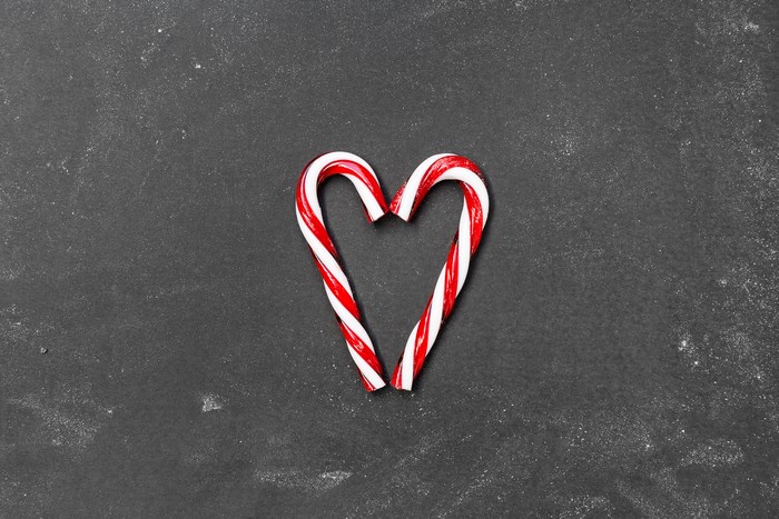 Heart Shaped Candy Canes on Dark Tabletop