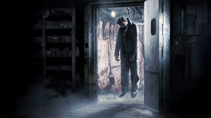 Man hanging in a meat locker