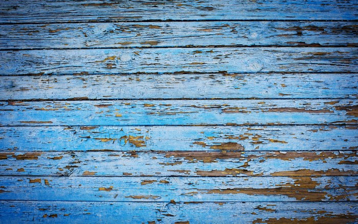 Peeling Blue Paint on Weathered Wood Planks