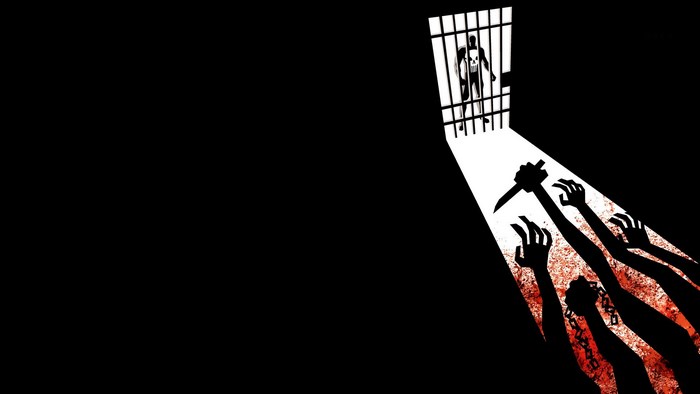 The Punisher in prison with reaching hands
