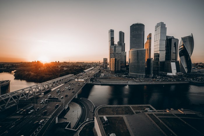 Moscow City skyscrapers and bridge at sunset