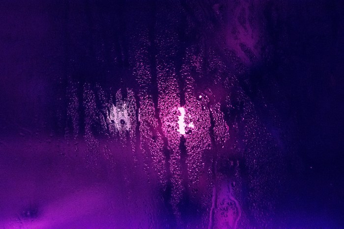 Purple and blue abstract background with water droplets