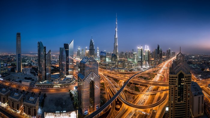 Dubai Skyline with Burj Khalifa and Highways at Dusk