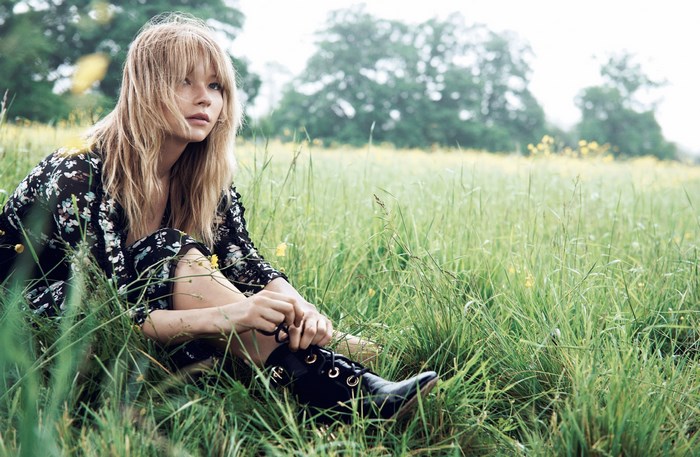Haley Bennett Sitting in a Lush Green Field