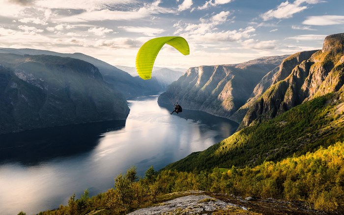 Paraglider over a Fjord in Norway