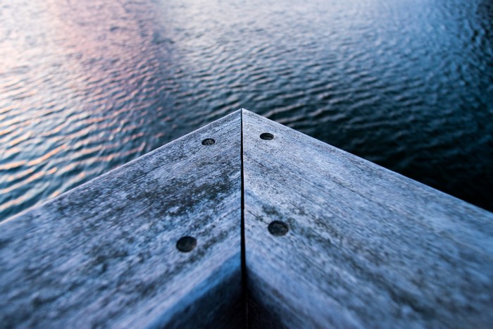 Wooden corner on a body of water