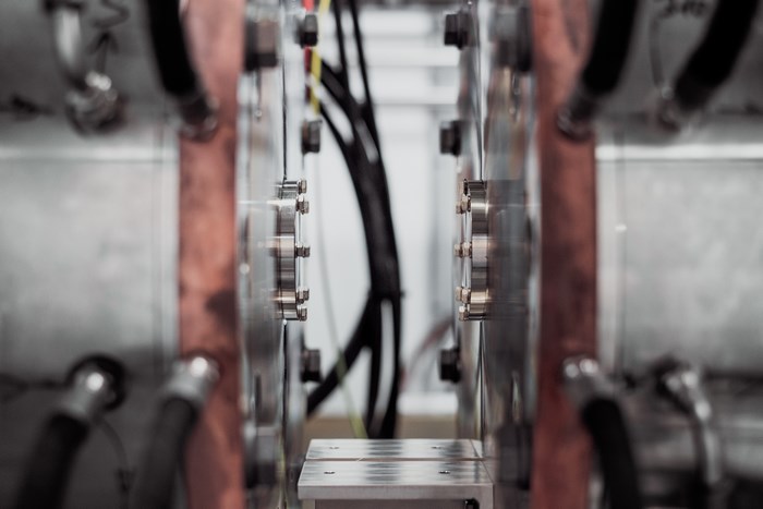 Close-up of industrial machinery with copper and metal components