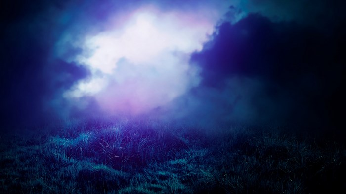 Dark fantasy landscape with glowing clouds and grass