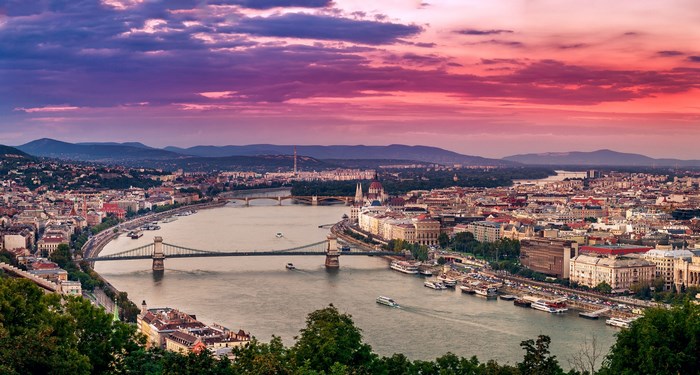 Budapest cityscape with Danube River and bridges at sunset