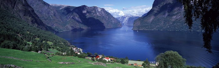 Stunning 4K View of Mountain Lake and Village