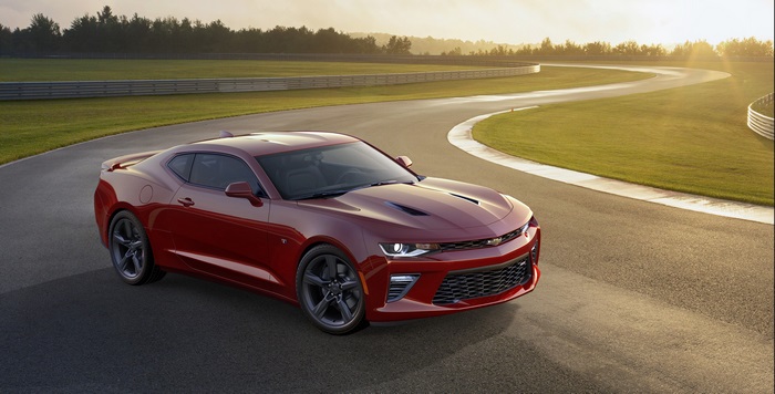 Red Chevrolet Camaro SS on a race track