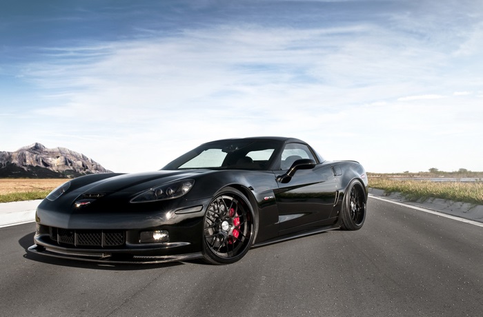 Black Chevrolet Corvette Z06 on a road