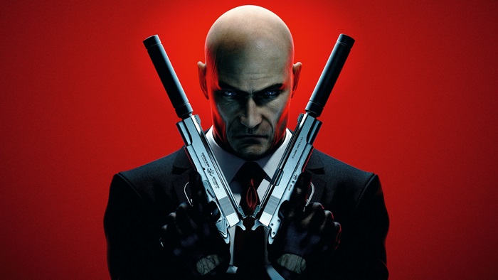 Agent 47 from Hitman holding two pistols