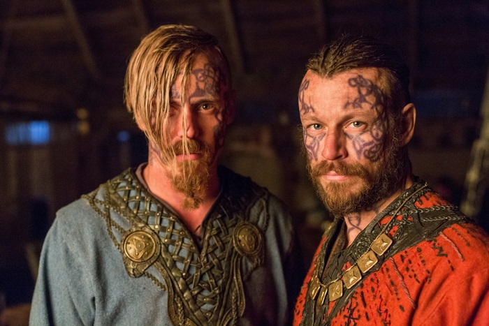 Two Vikings with face tattoos