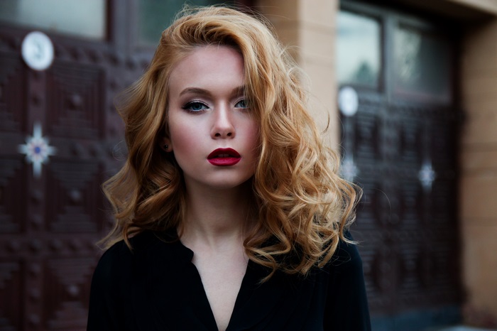 Woman with red lipstick and blonde hair