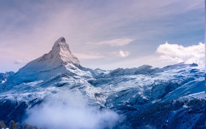 Matterhorn mountain in the Swiss Alps covered in snow