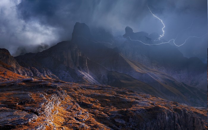 Stormy Lightning Over Dolomites Mountains in Italy
