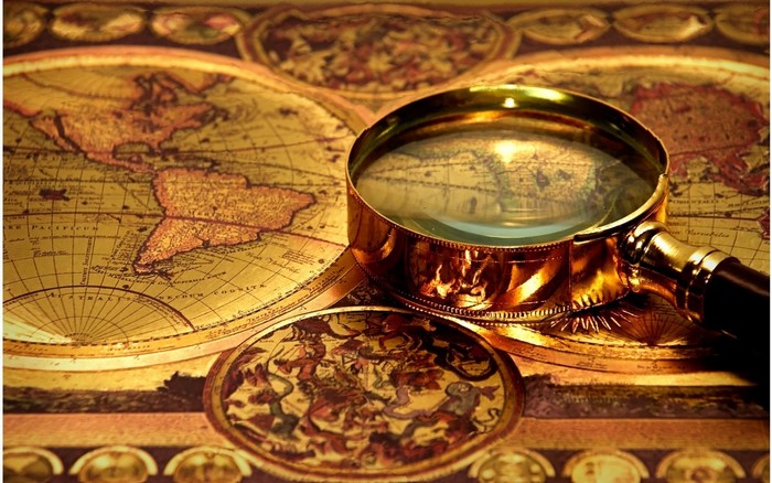 Vintage map with magnifying glass