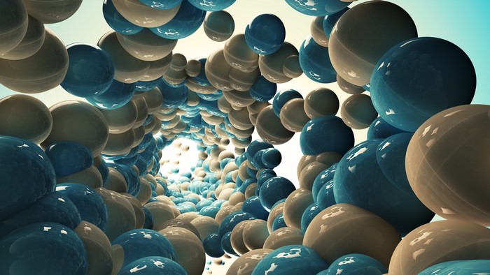 Abstract spiral of blue and beige spheres