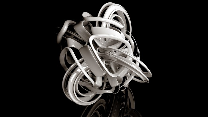 Abstract white sculpture on black background with reflection