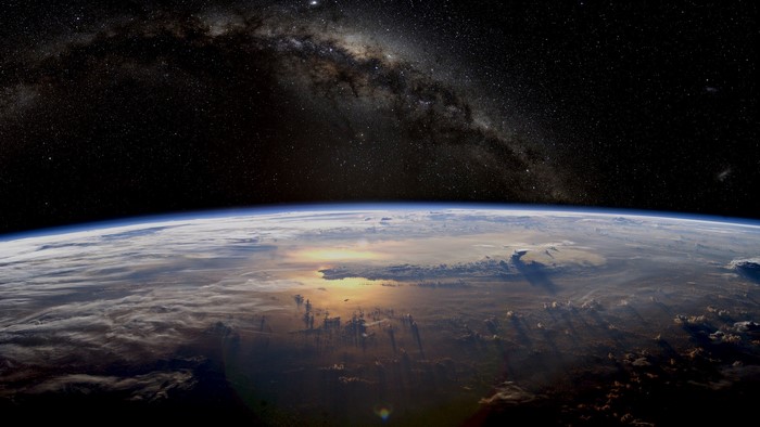 Earth and the Milky Way galaxy from space