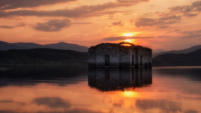 Ruined church in a lake at sunset, Bulgaria