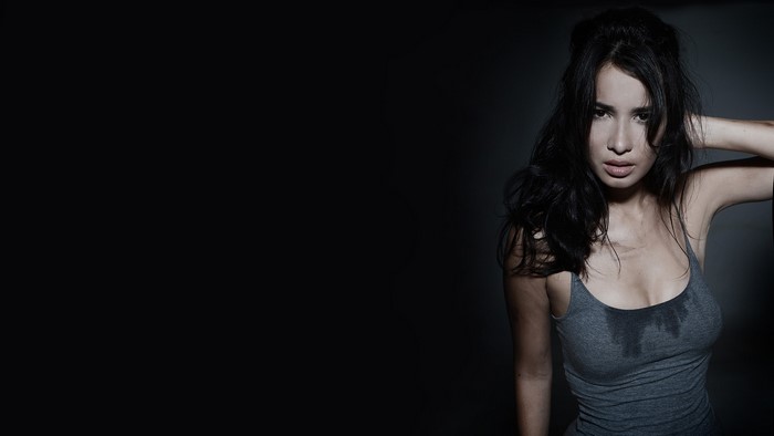 Woman in tank top with sweat stains