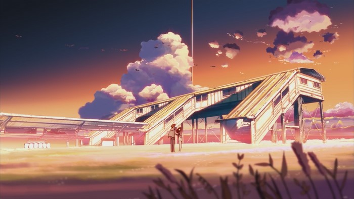 Anime couple at a train station at sunset