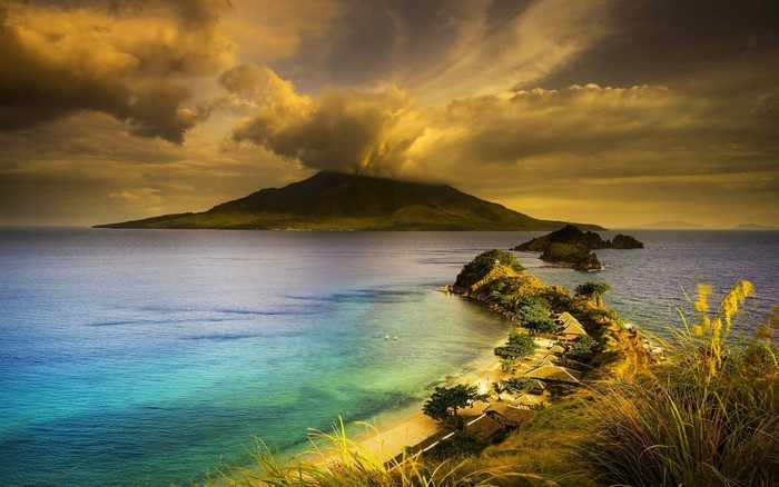 Volcano island with beach and peninsulas in the Philippines