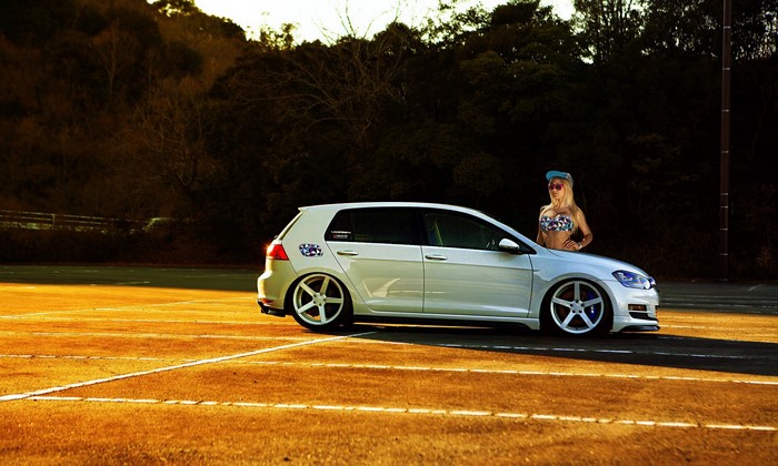 Volkswagen Golf 7 GTI with blonde woman