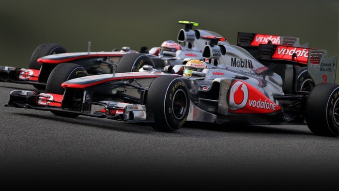 Lewis Hamilton and Jenson Button in McLaren Formula 1 Cars