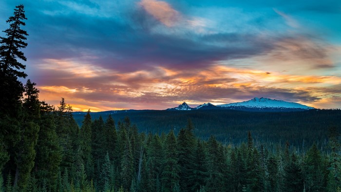 Sunset over Oregon mountains and forest