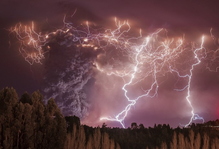 Volcanic lightning storm over a forest