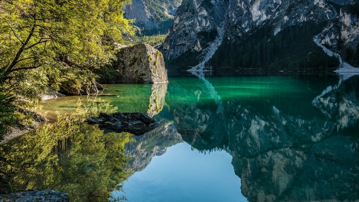 Lake in the Italian Alps with Mountain Reflection