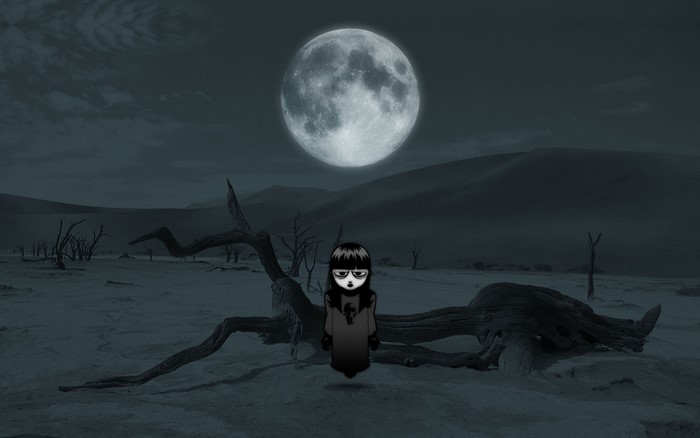 Creepy girl in desert landscape under the moon