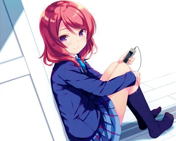 Maki Nishikino from Love Live! holding a music player