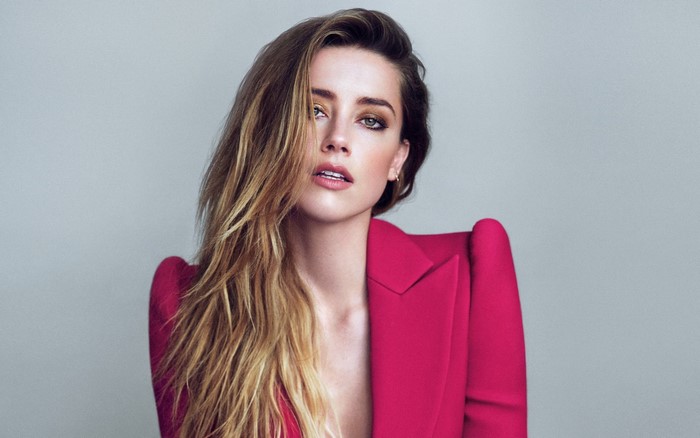 Amber Heard wearing a pink blazer