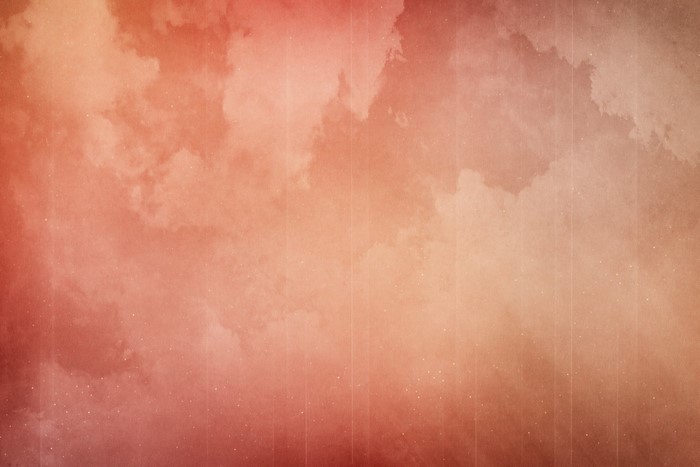 Orange and red textured clouds with light streaks