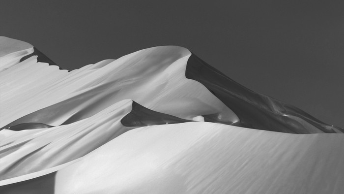 Black and white desert sand dunes landscape