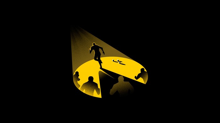 Pac-Man chasing a runner in a spotlight